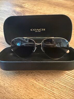 COACH Women’s Black and Gold Aviator Sunglasses